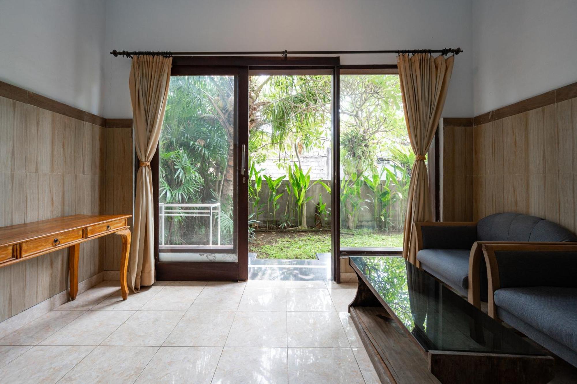 Agung Homestay Canggu Mitra Reddoorz Exterior photo