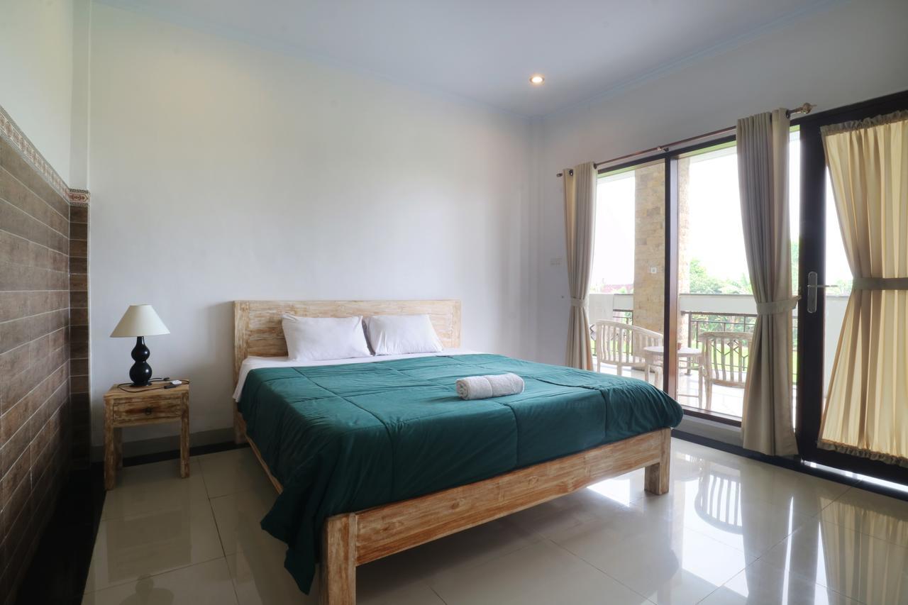 Agung Homestay Canggu Mitra Reddoorz Exterior photo